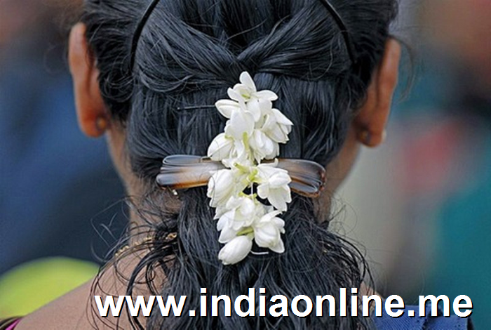Jasmine flowers adds a natural beauty to the hair of a ladies in Kerala